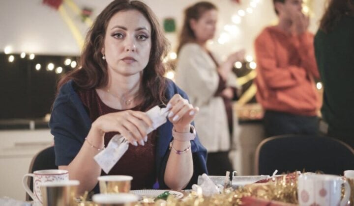 Lady stressed at Christmas table