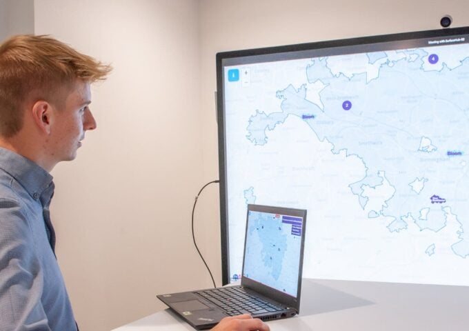 Jamie working on a digital map