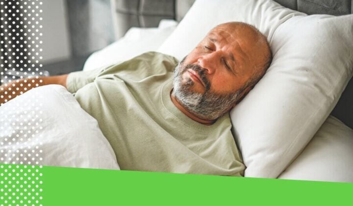 Man asleep in bed