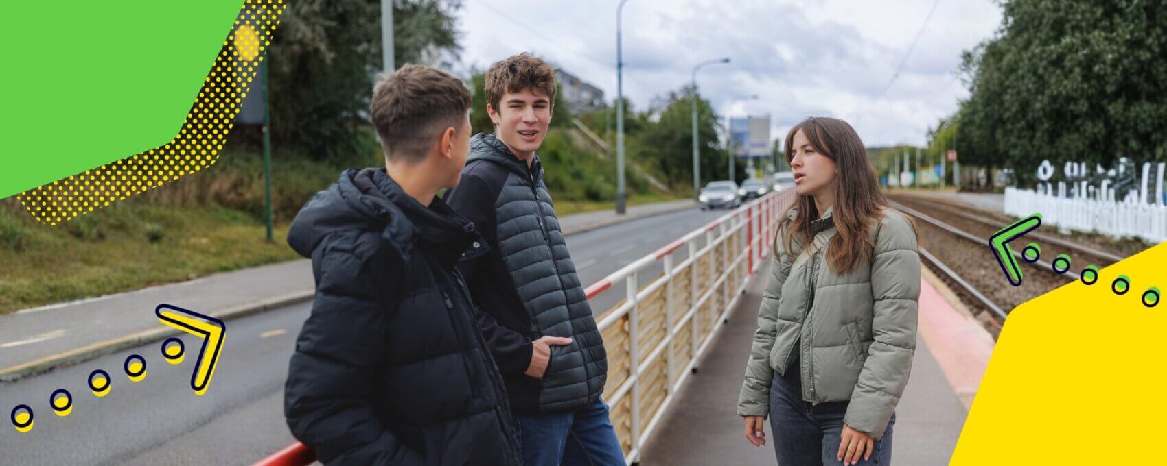 A group of three teenagers talking outside