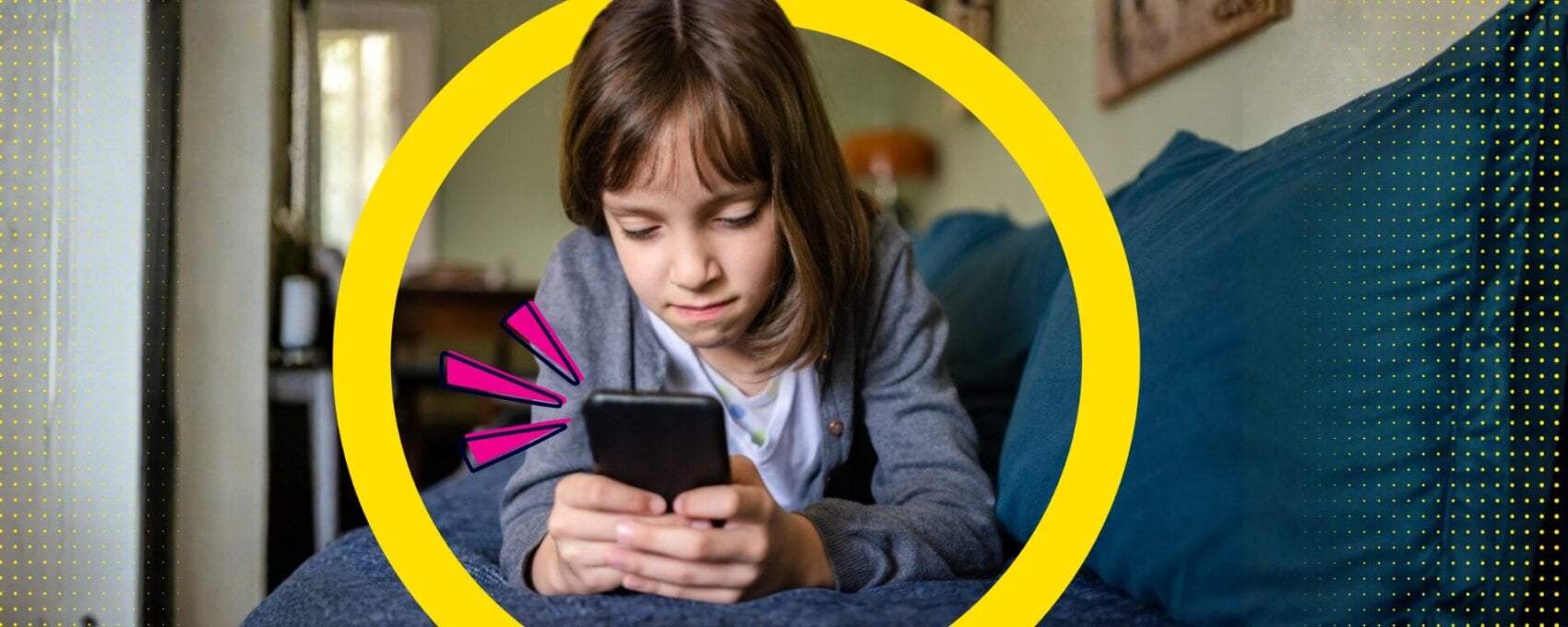Young girl looking at her mobile phone