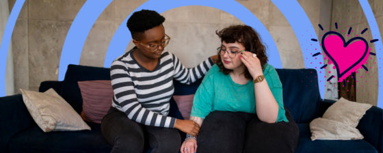 Woman with her arm around her friend