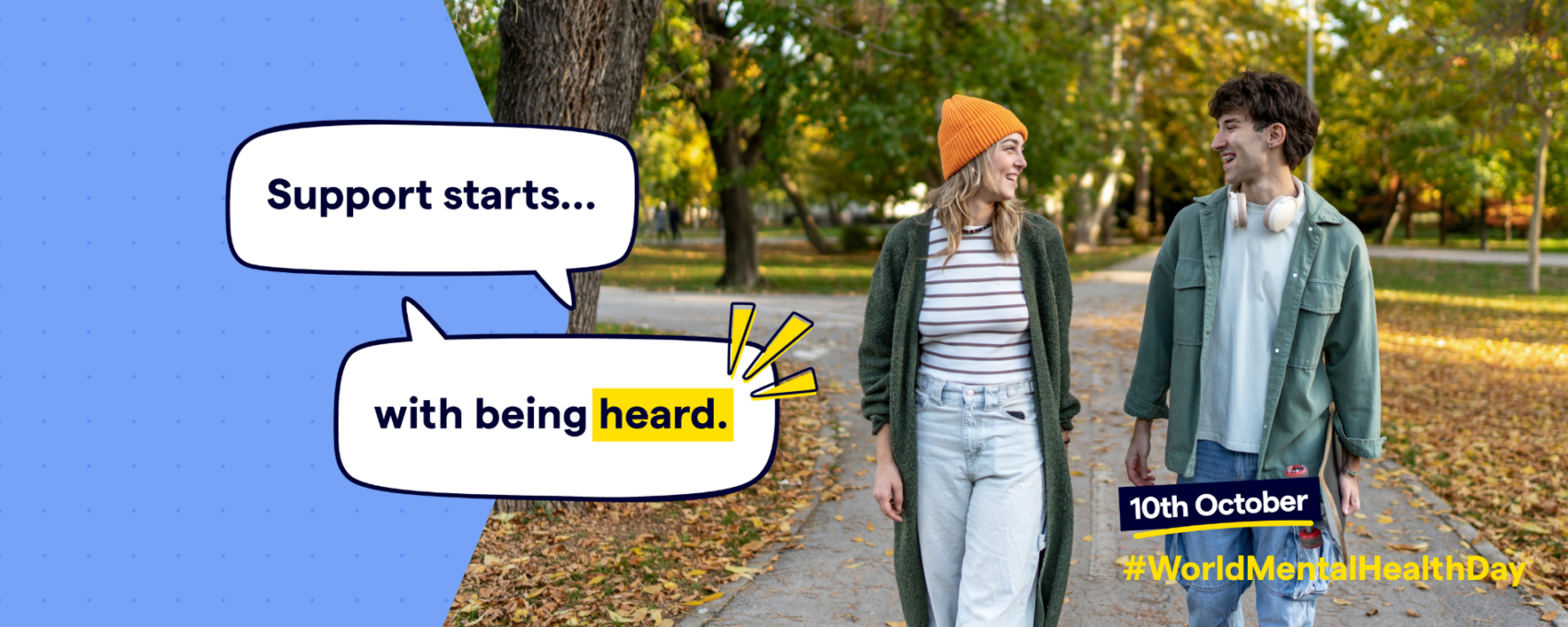 Two people walking and talking in a park